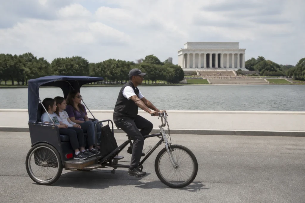 Family pedicab sightseeing near the National Mall in Washington DC