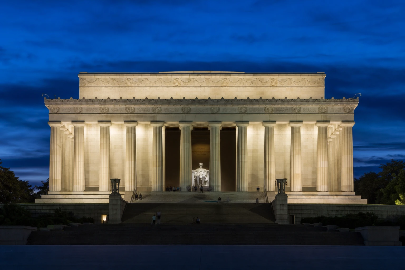 Illuminated Lincoln Memorial viewed from the front at night in Washington DC