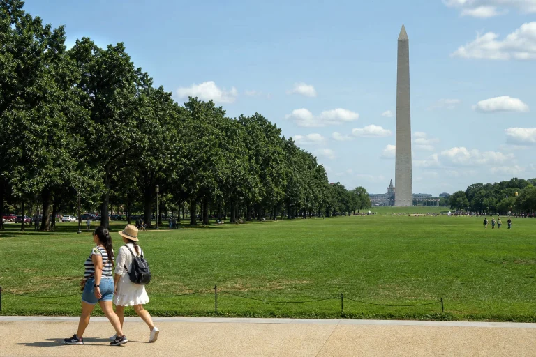 The National Mall and Washington Monument on a summer day in Washington DC.