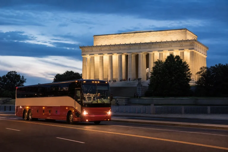Sightseeing bus near the illuminated Lincoln Memorial at night in Washington DC